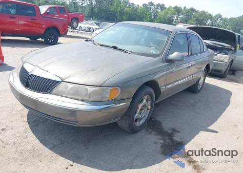 2000 Lincoln Continental z USA, uszkodzony, nr VIN 1LNHM97V0YY840446